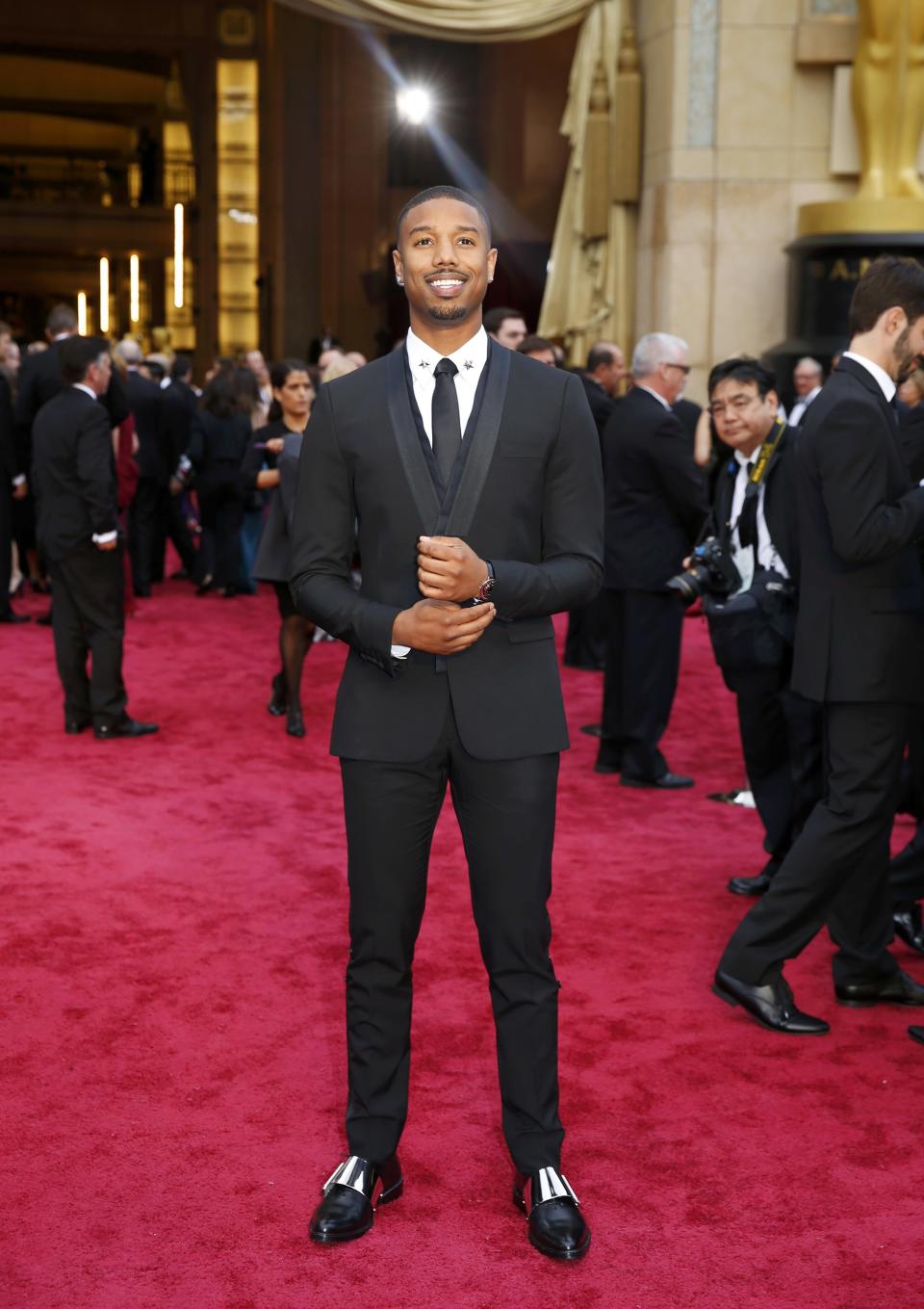 Actor Michael B. Jordan from the film "Fruitvale Station" arrives at the 86th Academy Awards in Hollywood, California March 2, 2014. REUTERS/Mike Blake (UNITED STATES TAGS: ENTERTAINMENT) (OSCARS-ARRIVALS)