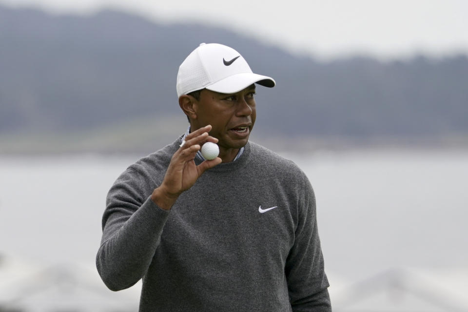 Tiger Woods waves after his putt on the 14th hole during the third round of the U.S. Open Championship golf tournament, Saturday, June 15, 2019, in Pebble Beach, Calif. (AP Photo/Carolyn Kaster)