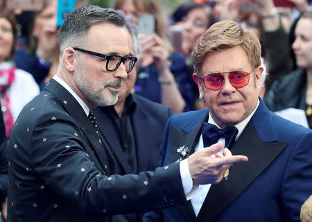 Elton John and his husband David Furnish attend the UK premiere of the Elton John biopic 'Rocketman' in London, Britain, May 20, 2019. REUTERS/Simon Dawson