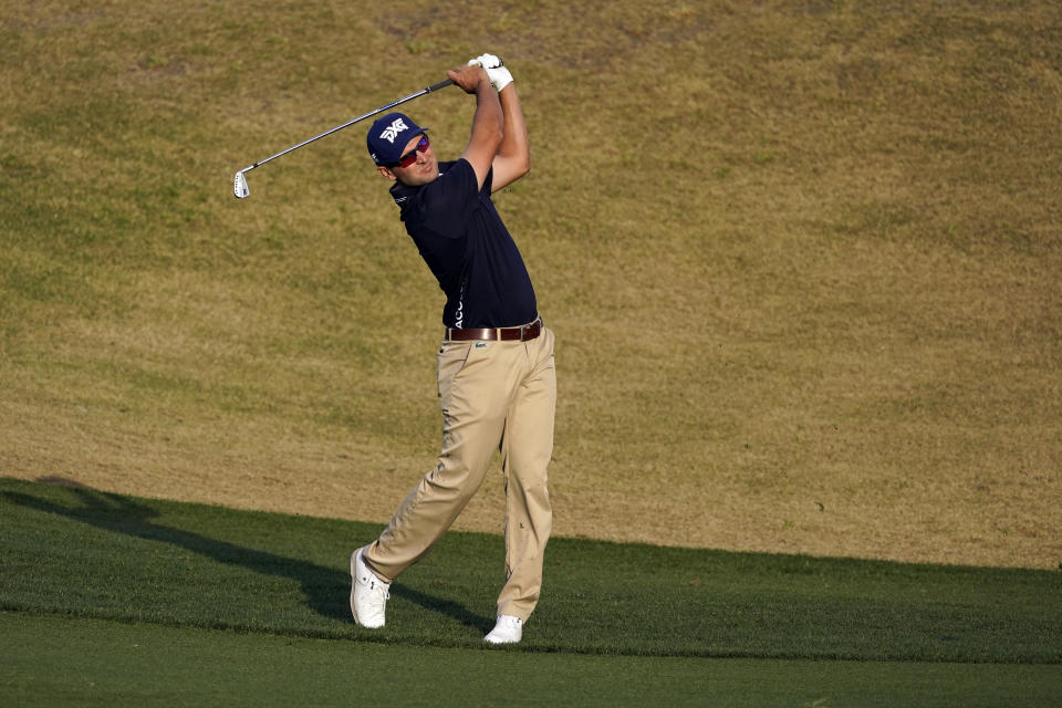 Paul Barjon hits from the fairway to the eighth green during the third round of the American Express golf tournament on the Pete Dye Stadium Course at PGA West oon Saturday, Jan. 22, 2022, in La Quinta, Calif. (AP Photo/Marcio Jose Sanchez)