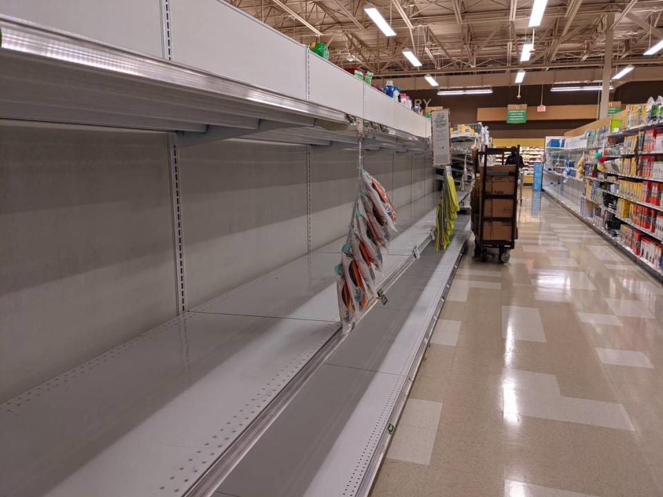 Shelves for paper towels were empty Friday morning at the Publix store on South Tryon Street in Steele Creek.