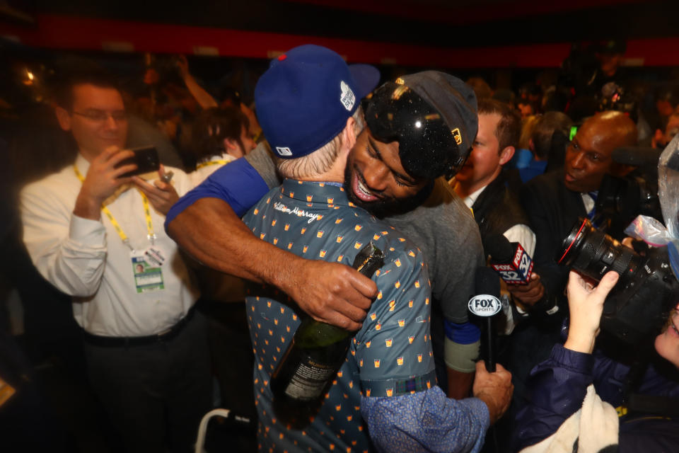 CLEVELAND, OH - NOVEMBER 2:  Dexter Fowler #24 of the Chicago Cubs celebrates with Bill Murray in the clubhouse after defeating the Cleveland Indians in Game 7 of the 2016 World Series bat Progressive Field on Wednesday, November 2, 2016 in Cleveland, Ohio. (Photo by Alex Trautwig/MLB Photos via Getty Images) 