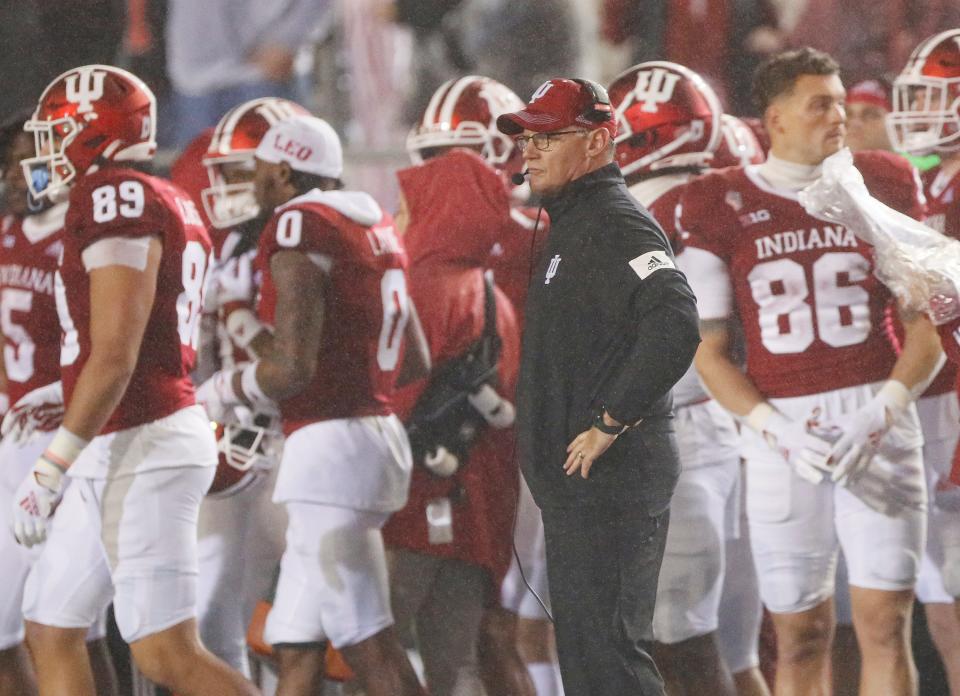 Indiana Hoosiers head coach Tom Allen watches from the sideline during the fourth quarter of the NCAA football game at Memorial Stadium in Bloomington, Ind. on Saturday, Oct. 23, 2021. Ohio State won 54-7.