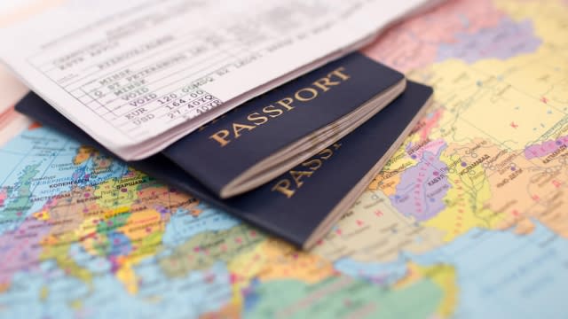 Passports and a world map.