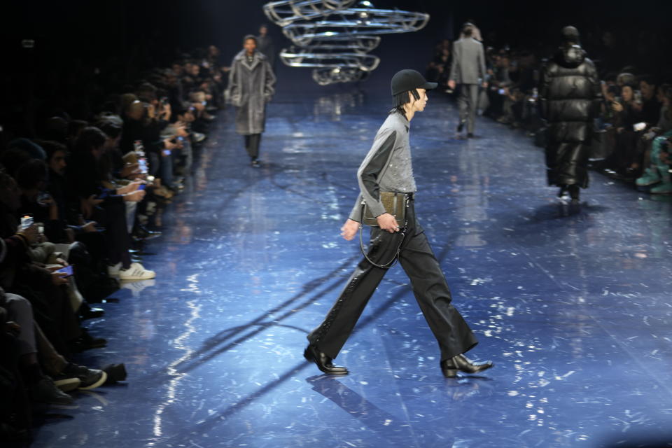 A model wears a creation as part of the Fendi menswear Fall-Winter 2023-24 collection presented in Milan, Italy, Saturday, Jan. 14, 2023. (AP Photo/Luca Bruno)