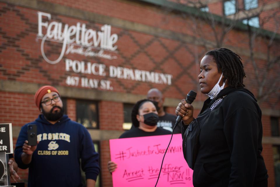 Demonstrators march from the Cumberland County Law Enforcement Center to Fayetteville Police Department and back during a Justice for Jason Walker demonstration on Sunday, Jan. 9, 2022.  Walker, 37, was shot and killed on Saturday by an off-duty deputy with the Cumberland County Sheriff’s Office.