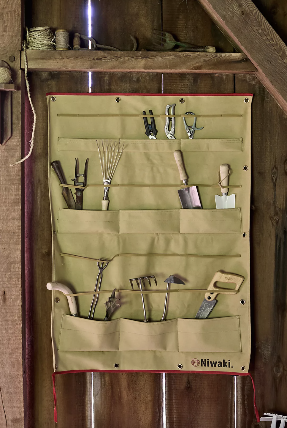 a wooden cabinet full of tools