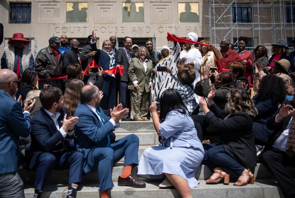 Diane Nash cuts the ribbon commemorating the naming of “Diane Nash Plaza” in front of the Historic Metro Courthouse in Nashville, Tenn., Saturday, April 20, 2024.