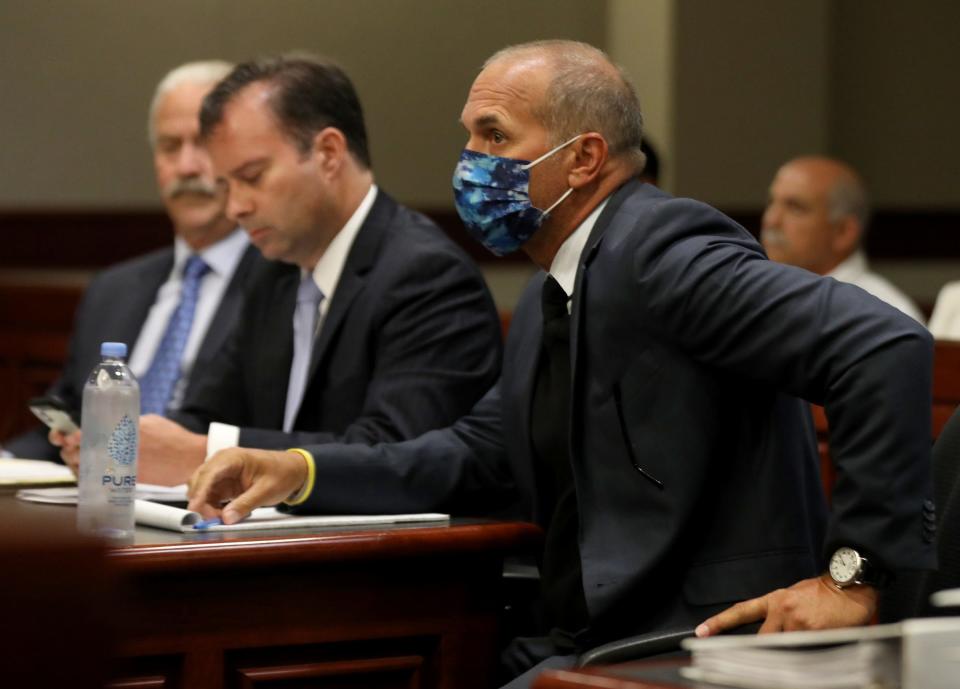 Former Macomb County prosecutor Eric Smith looks toward the first witness in the courtroom of visiting judge Cynthia Arvant inside 41B District Court in Clinton Township, Michigan, on July 9, 2021.