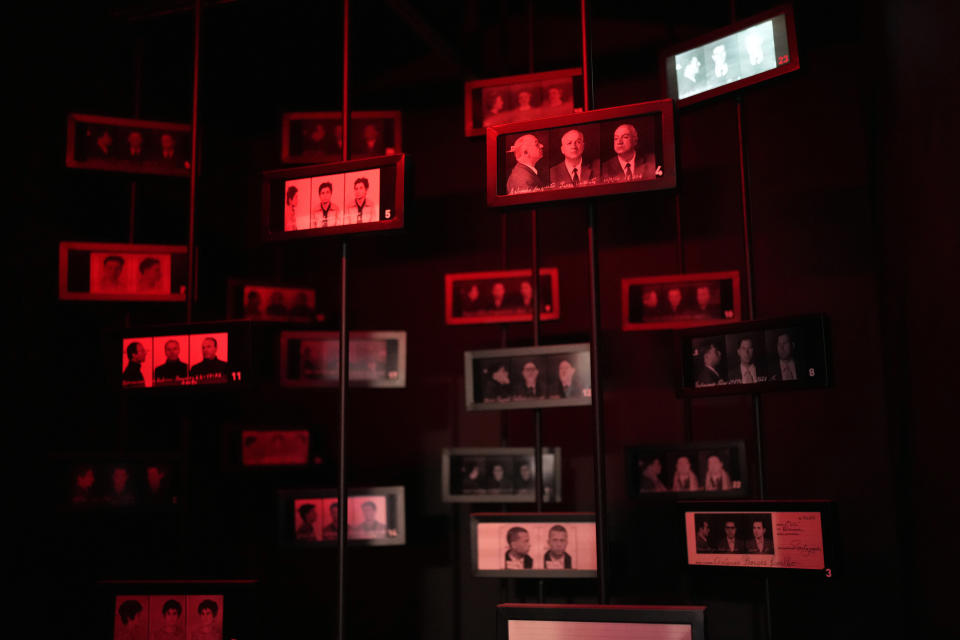 Marking the 50th anniversary of the Carnation Revolution, police mug shots of political prisoners are displayed at the Aljube Museum Resistance and Freedom, formerly a prison of the political police, in Lisbon, April 24, 2024. The April 25, 1974 revolution carried out by the army restored democracy in Portugal after 48 years of a fascist dictatorship. (AP Photo/Armando Franca)