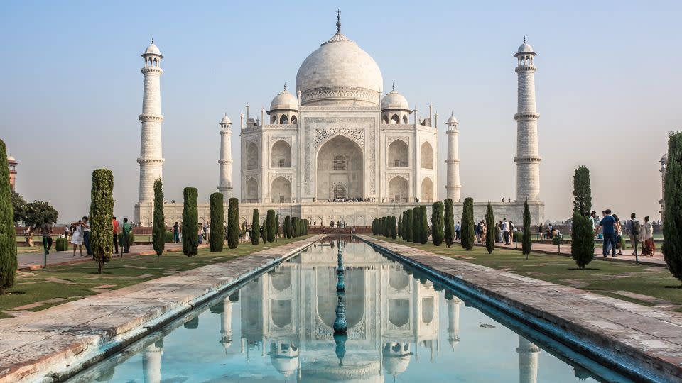 The Taj Mahal is an ivory-white marble mausoleum on the south bank of the Yamuna river in the Indian city of Agra. - Kriangkrai Thitimakorn/Moment RF/Getty Images