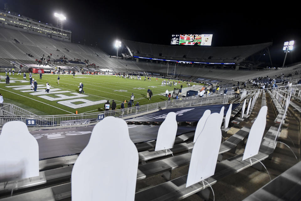 Cutout fans line the south stands before an NCAA college football game between Penn State and Ohio State in State College, Pa., Saturday, Oct. 31, 2020. (AP Photo/Barry Reeger)