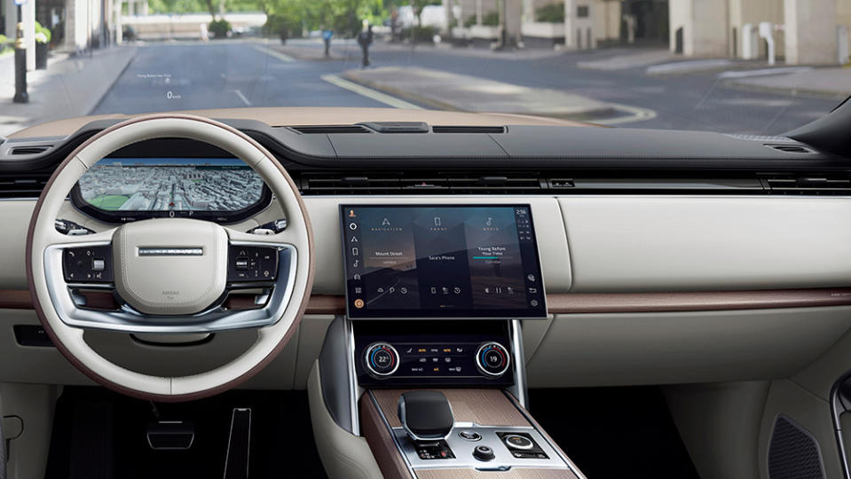 Range Rover adopted Jaguar Land Rover’s Privi Pro infotainment system, with a 13.1-inch touchscreen and wireless-device charging. - Credit: Photo: Courtesy of Jaguar Land Rover Automotive PLC.