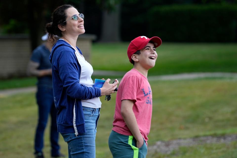 Sahrena London and her son, Gabriel Mincer, 12, watch as the Taylor Bliss historic home is being cut into multiple pieces. London said it is, "an incredible moment".  Monday, June 26, 2023 