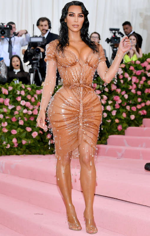 <p>Dia Dipasupil/FilmMagic</p><p>Kim Kardashian wore a custom Thierry Mugler dress with a <em>very </em>snug corset to the 2019 Met Gala, explaining that the designer's vision was of "this California girl stepping out of the ocean, wet, dripping." She <a href="https://people.com/style/kim-kardashian-painful-corset-under-met-gala-2019-dress/" rel="nofollow noopener" target="_blank" data-ylk="slk:told;elm:context_link;itc:0;sec:content-canvas" class="link ">told</a> <em><a href="https://people.com/style/kim-kardashian-painful-corset-under-met-gala-2019-dress/" rel="nofollow noopener" target="_blank" data-ylk="slk:The Wall Street Journal;elm:context_link;itc:0;sec:content-canvas" class="link ">The Wall Street Journal</a> </em>that she had to practice wearing the "insane" corset, which she said left indentations on her skin and made it difficult for her to breathe.</p>