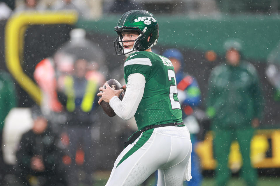 Dec 10, 2023; East Rutherford, New Jersey, USA; New York Jets quarterback Zach Wilson (2) drops back to pass during the first half against the Houston Texans at MetLife Stadium. Mandatory Credit: Vincent Carchietta-USA TODAY Sports