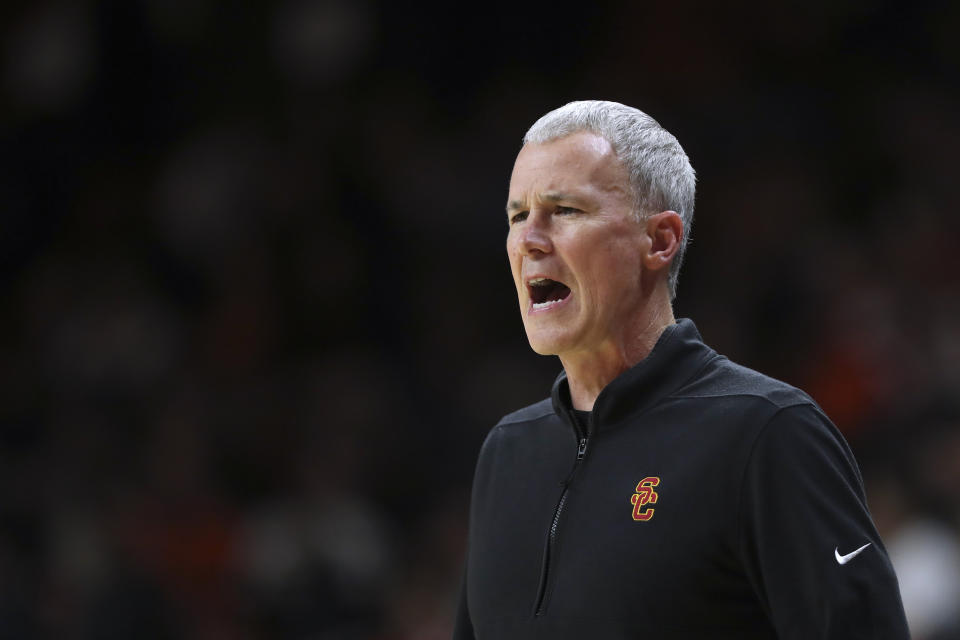 Southern California coach Andy Enfield calls out to players during the first half of the team's NCAA college basketball game against Oregon State on Saturday, Dec. 30, 2023, in Corvallis, Ore. (AP Photo/Amanda Loman)