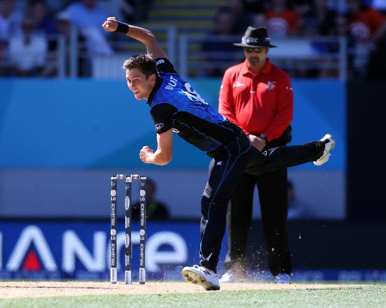 New Zealand's Trent Boult bowls during the Pool A 2015 Cricket World Cup match between New Zealand and Australia at Eden Park in Auckland on February 28, 2015