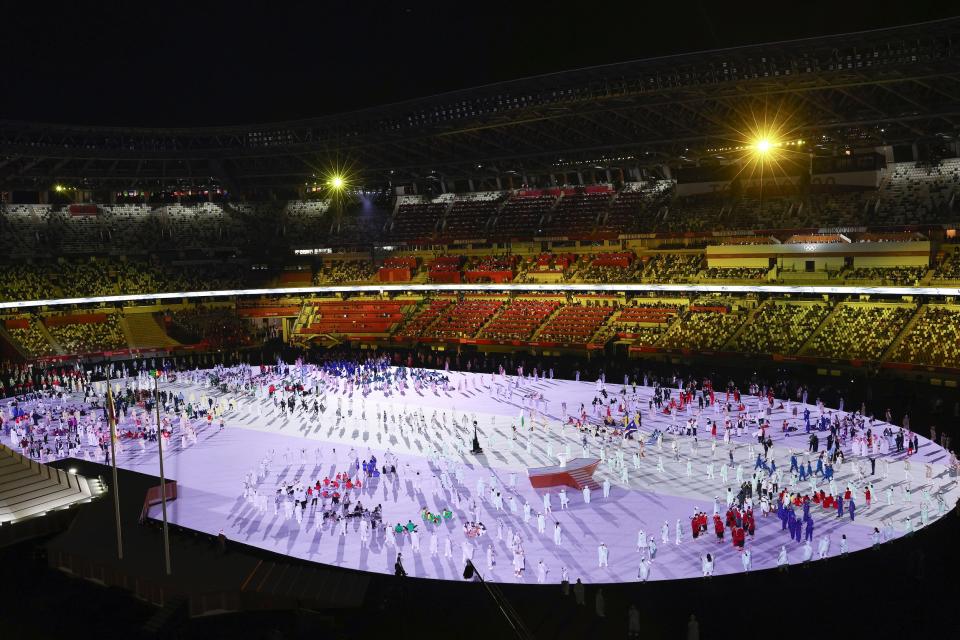 Athletes gather during the opening ceremony of the Tokyo 2020 Olympic Games.