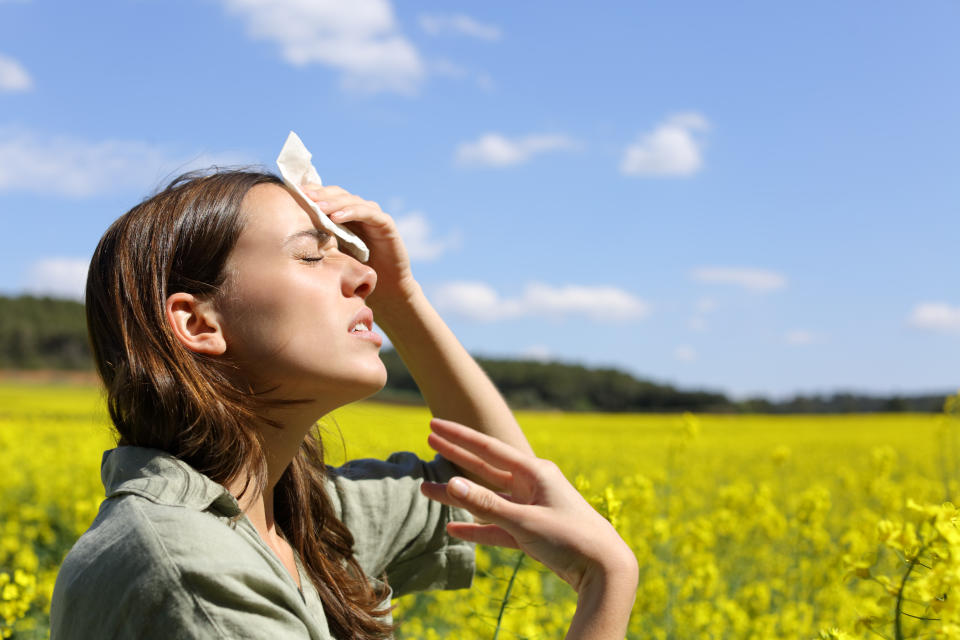 Side view portrait of a stressed woman suffering heat stroke in summer vacation