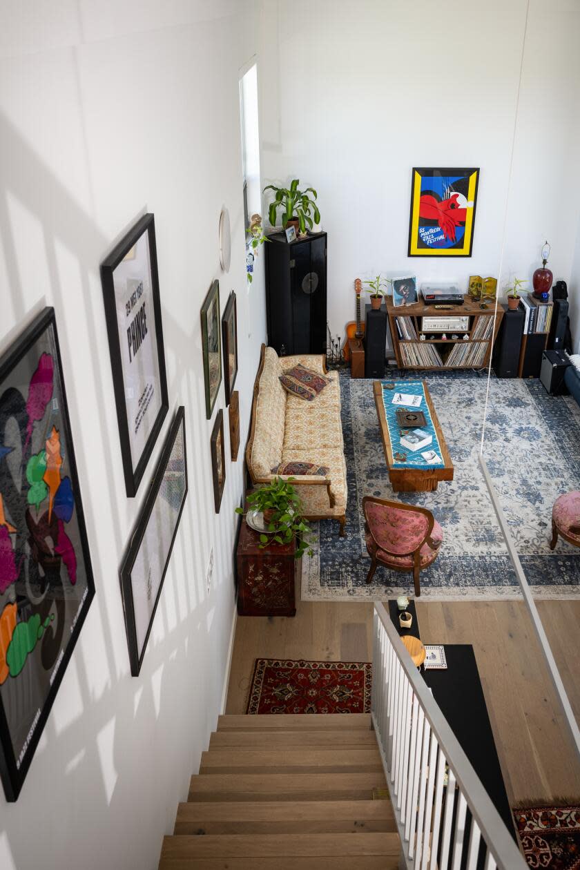 A view of the living room from the top of the staircase in a two-bedroom ADU.