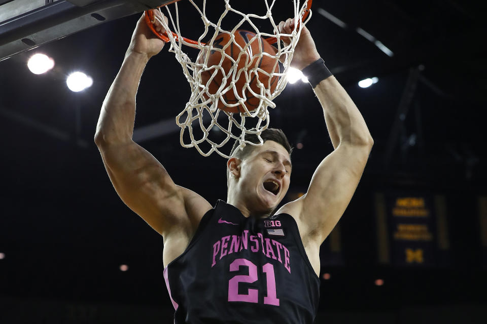 Penn State forward John Harrar (21) dunks against Michigan in the first half of an NCAA college basketball game in Ann Arbor, Mich., Wednesday, Jan. 22, 2020. (AP Photo/Paul Sancya)