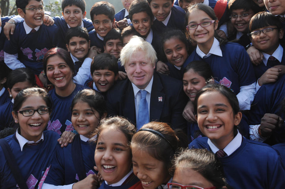 London Mayor Boris Johnson is mobbed by school children in Delhi today after he handed over the London 2012 Olympic cauldron petals to Indian Olympians. The petals which were part of the Thomas Heatherwick designed cauldron which burnt throughout the Olympic and Paralympic Games will be given to every competing nation.