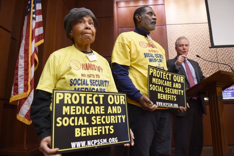 Sen. Chris Van Hollen, D-Md., (R) speaks at an event hosted by the National Committee to Preserve Social Security & Medicare at the U.S. Capitol in Washington D.C., February 14, 2017. On April 27, 1937, the first Social Security payment was made in the United States. File Photo by Molly Riley/UPI