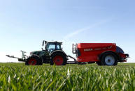 Optical sensors, Trimble Navigation Ltd’s 'GreenSeeker' devices to instantly adjust nitrogen fertilization, are seen installed at a tractor in a wheat field in the Bavarian town of Irlbach near Deggendorf, Germany, April 21, 2016. REUTERS/Michaela Rehle