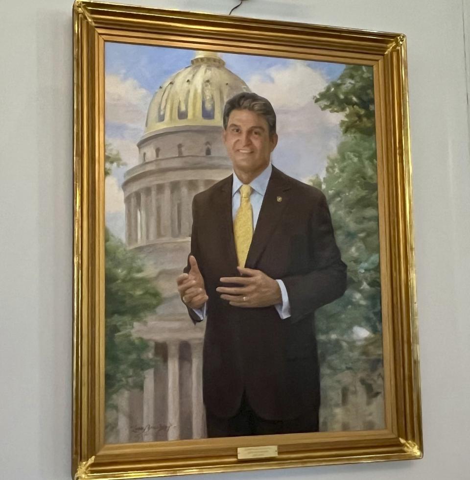 The official portrait of Joe Manchin as West Virginia's governor hangs on a wall in the governor's reception room Thursday, June 6, 2024, at the state Capitol in Charleston, W.Va. Five months before the general election, Manchin is still not a declared candidate for any office. But there's still time to mull potential runs for governor, the Senate, and even the U.S. presidency. (AP Photo/John Raby)