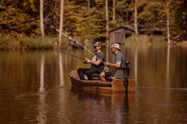 Eric Church and Morgan Wallen — seen here in a boat — are part of a group of investors who are relaunching 'Field & Stream' as a brand and print magazine. - Credit: Victoria Will/Courtesy of Field & Stream*