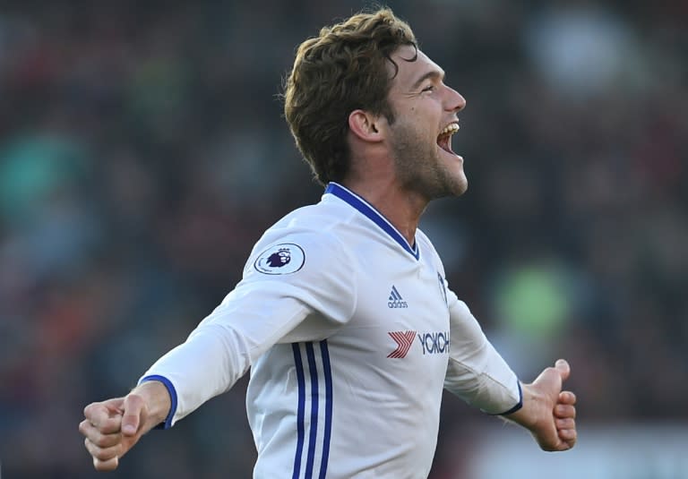 Chelsea's Marcos Alonso celebrates scoring their third goal from a free kick against Bournemouth a at the Vitality Stadium in Bournemouth, southern England on April 8, 2017