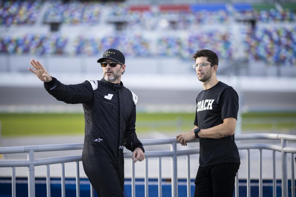 DAYTONA BEACH, FLORIDA - JANUARY 31: Jimmie Johnson (L) and Jordan Taylor (R) talk during the NASCAR Garage 56 Test at Daytona International Speedway on January 31, 2023 in Daytona Beach, Florida. (Photo by James Gilbert/Getty Images)