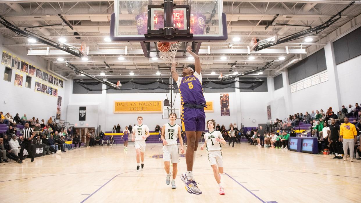 Camden's Teron Murray dunks the ball during the Camden County Boys Basketball Tournament championship game between Camden and Camden Catholic played at Camden High School on Friday, February 16, 2024.