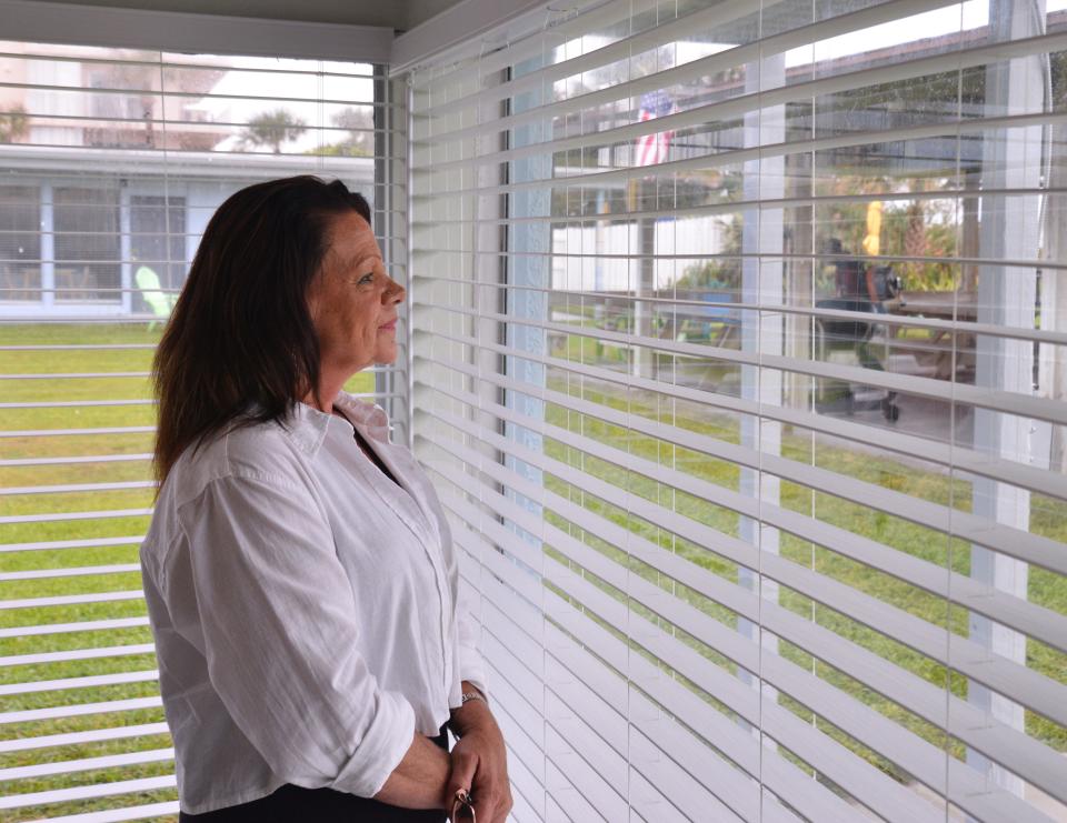 Roseann Moore, assistant general manager of the Sea Aire Oceanfront Inn in Cocoa Beach, standing in Room 9 of the 17-room hotel, says short-term rentals aren’t hurting the hotel. The hotel has regulars who come every year, and also are serving many Port Canaveral cruise customers.