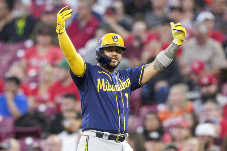 Milwaukee Brewers' Omar Narvaez reacts after hitting a single during the third inning of a baseball game against the Cincinnati Reds, Saturday, Sept. 24, 2022, in Cincinnati. (AP Photo/Jeff Dean)