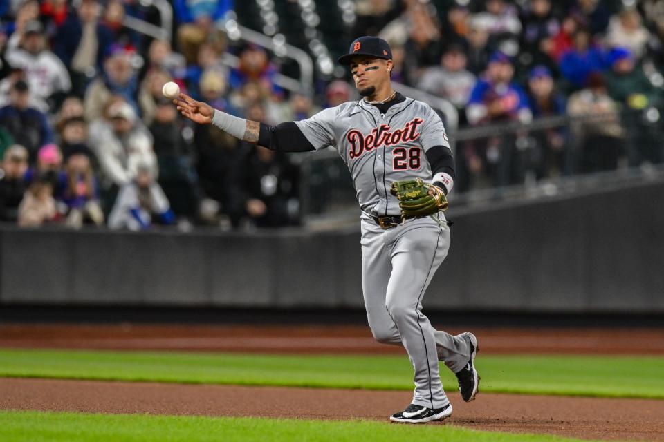 Detroit Tigers shortstop Javier Baez fields a ground ball and throws to first base for an out during the fourth inning against the New York Mets at Citi Field in New York City, New York on April 1, 2024.