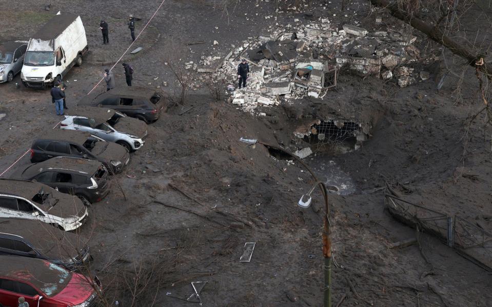 A crater caused by Russia's attack on Kyiv early on Thursday