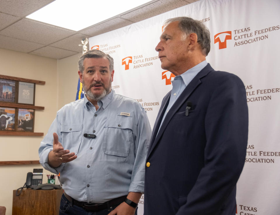 U.S. Sen. Ted Cruz, R-Texas, left, talks about rising agriculture costs along with Sen. John Boozman, R-Arkansas, Tuesday at the Texas Cattle Feeders Association in Amarillo.