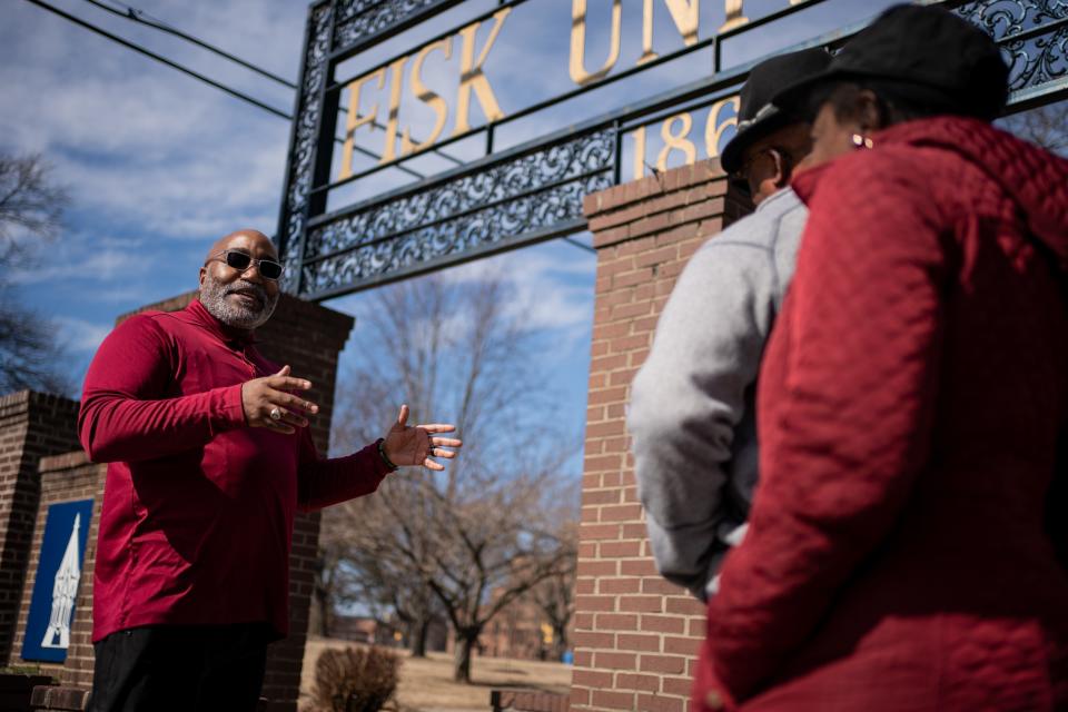 Fred Whitley Jr. speaks to people on his tour during a stop at the Fisk University campus in Nashville, Tenn., Saturday, Feb. 11, 2023. Whitley leads a bus tour that focuses on Black history in Nashville. 