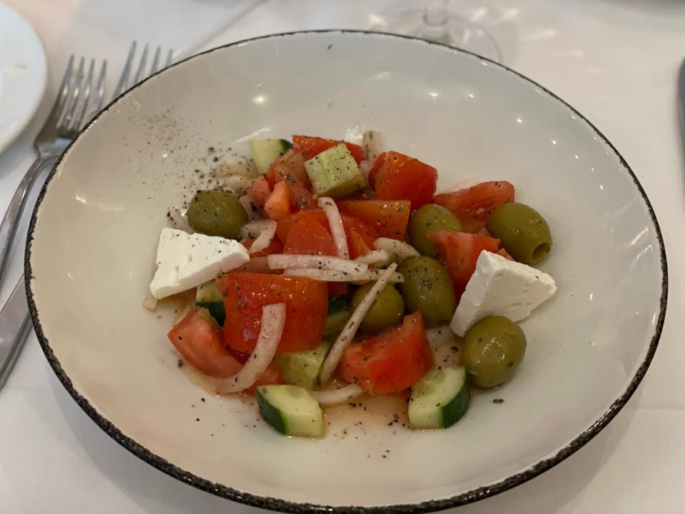 Mediterranean salad on a plate at a chain restaurant