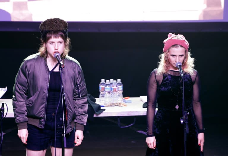 Nastya (L) and Maria Alyokhina of Russian Band Pussy Riot perform onstage at the Fonda Theater in Hollywood, California