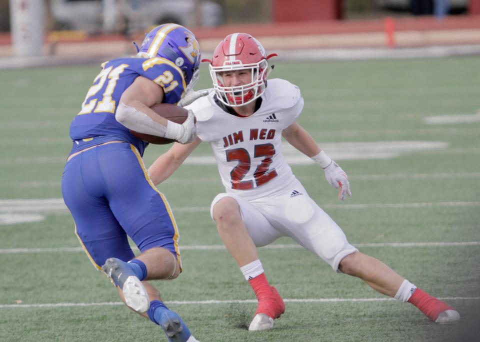 Jim Ned defensive back Austin Ellis tries to wrap up Brock running back Kutter Wilson in the regional semifinals.