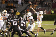 Tennessee quarterback Jarrett Guarantano (2) throws a touchdown pass during the second half of the team's NCAA college football game against South Carolina on Saturday, Sept. 26, 2020, in Columbia, S.C. (AP Photo/Sean Rayford)