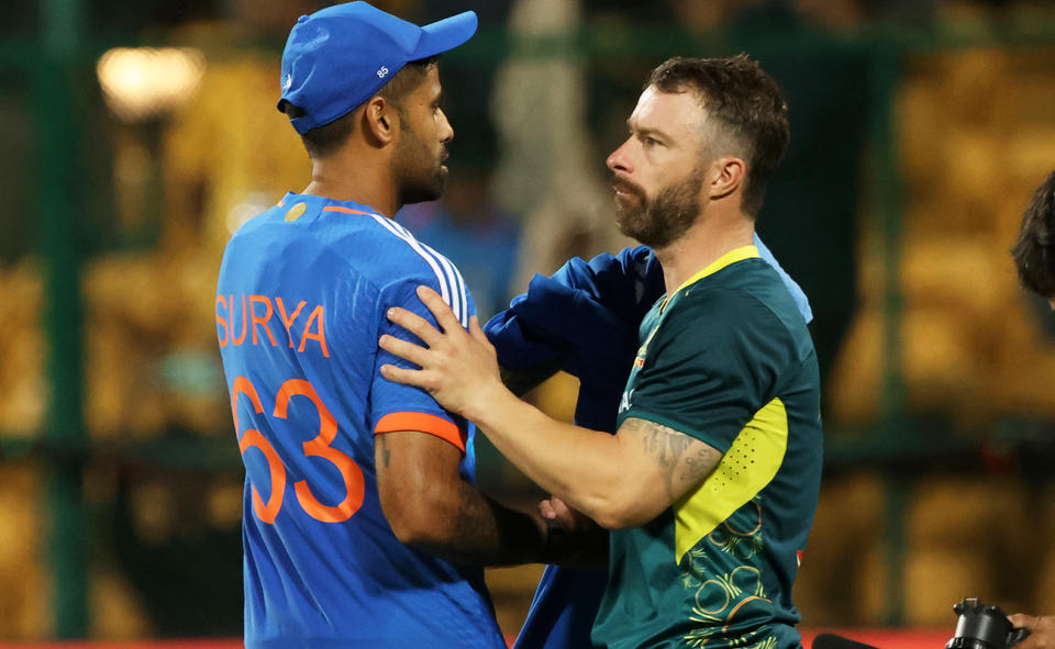 Suryakumar Yadav and Matthew Wade, pictured here after the fifth T20 between Australia and India.