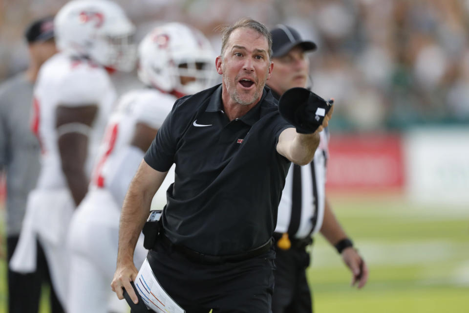 Western Kentucky coach Tyson Helton reacts to a play during the first half of the team's NCAA college football game against Hawaii, Saturday, Sept. 3, 2022, in Honolulu. (AP Photo/Marco Garcia)