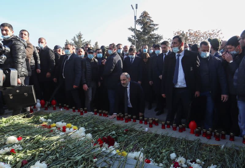 Armenian Prime Minister Pashinyan visits a military cemetery on the day of nationwide mourning in Yerevan