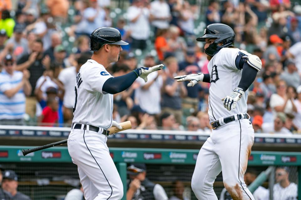Tigers' Eric Haase, right, celebrates with Spencer Torkelson after hitting a solo home run off of Orioles' Bruce Zimmermann during the fifth inning in Detroit, Saturday, May 14, 2022.