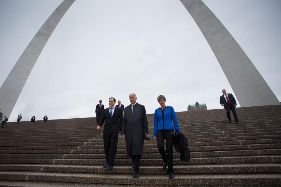 Biden, St. Louis Mayor Francis Slay, left, and Secretary of the Interior Sally Jewell walk down the stairs underneath the Gateway Arch, at the Jefferson National Expansion Memorial in St. Louis, Missouri, on May 13, 2014.