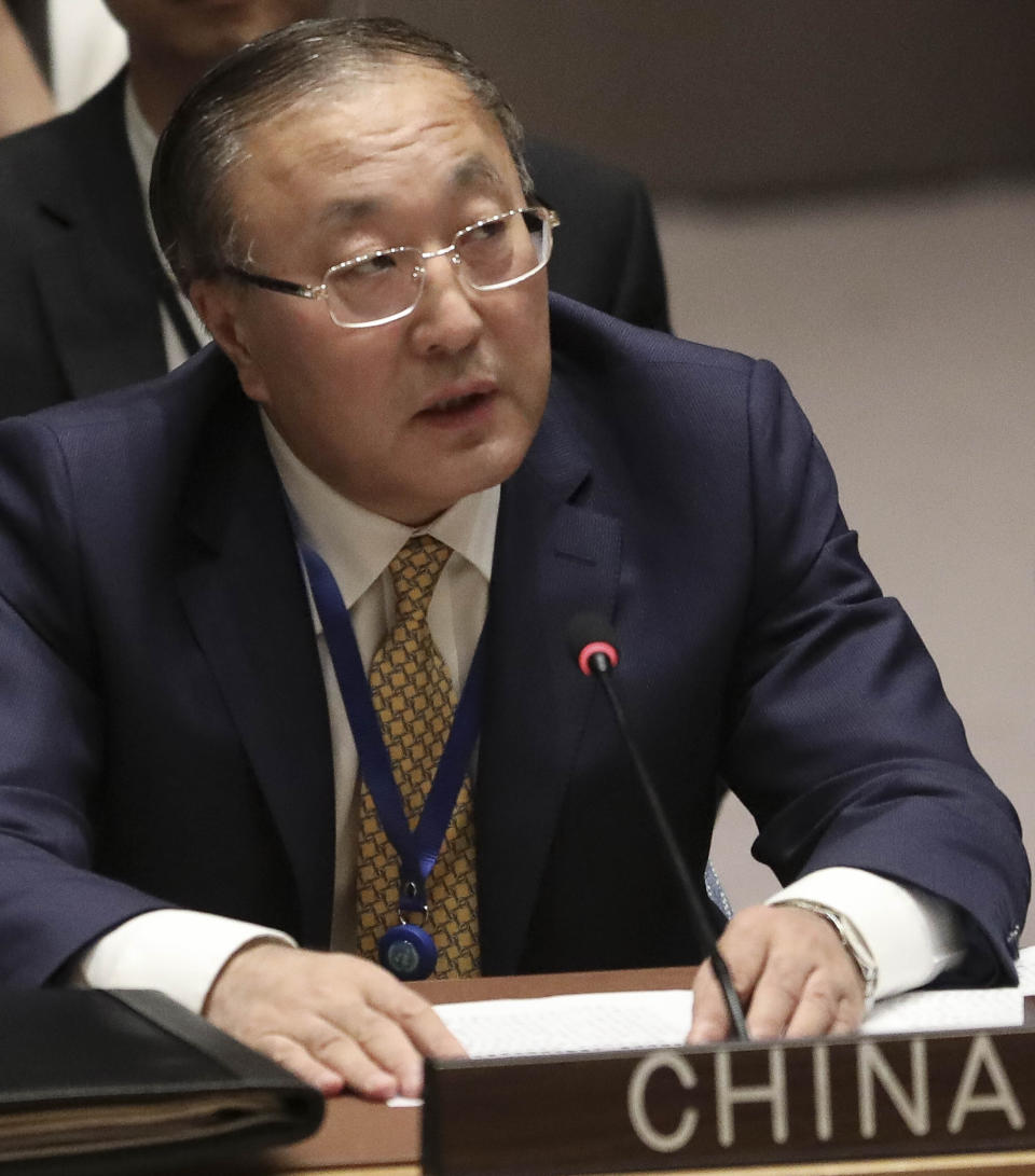 China's new United Nations Ambassador Zhang Jun address a meeting of the United Nations Security Council on the Mideast, Tuesday, Aug. 20, 2019 at U.N. headquarters. (AP Photo/Bebeto Matthews)